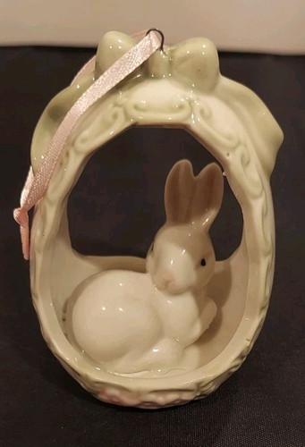 Porcelain rabbit sitting - sitting, in